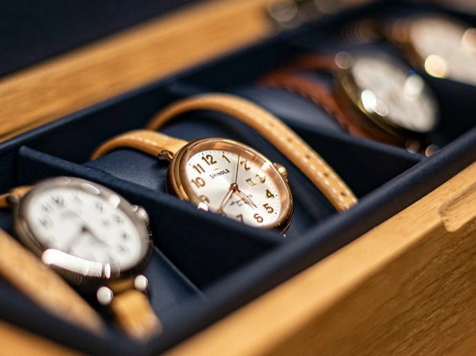 gold and white analog watch